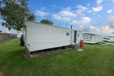 Image de Lovely 6 berth caravan for hire by the beach at California Cliffs ref 50010b