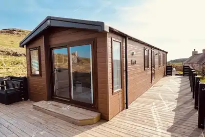 Image de The Lodge At Pennant-Igyn, pet friendly, with a garden in Llanbedrog