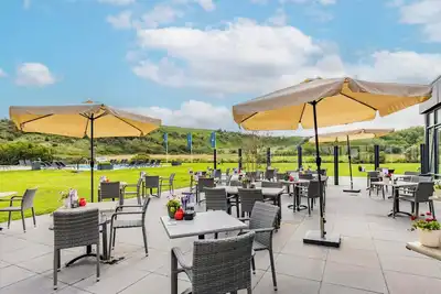 Beachside Break with Poolside Chill, Direct Shoreline Access & Bikes