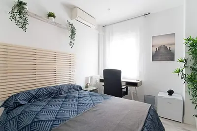 Image de Paris : chambre avec confort, convivialité et espaces communs Chamartín – Mauricio Legendre