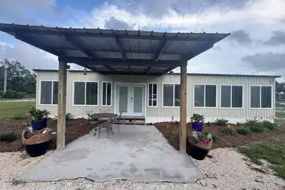 Image de Charming 3-bedroom 2 bath home with WiFi, games, & full gym. 1. 5 miles from ramp.