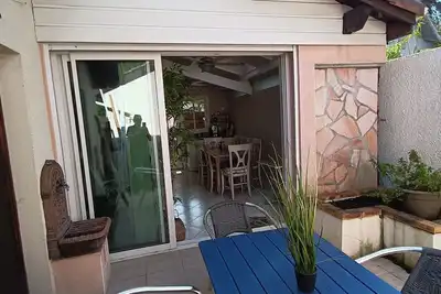 Image de Maison proche du port, clim, vélos, terrasse, parking.