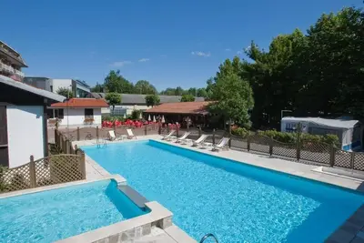 Image de Camping Smeraldo Dormeletto Mobilehome Standard with lake view for 4 persons