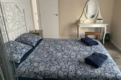 Image de Family friendly apartment in a historic landmark with balcony and sea views.