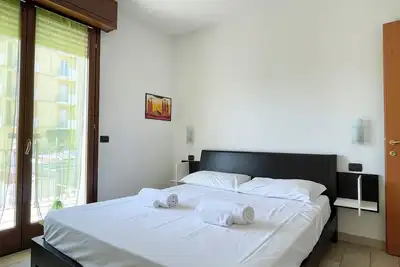 Image de Bilocale con terrazzo e parcheggio – Alba Blu