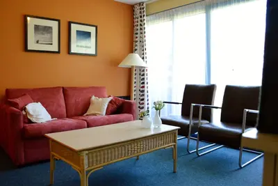 Image de Fine apartment near beach, dunes and forest. With free use of swimming pool.