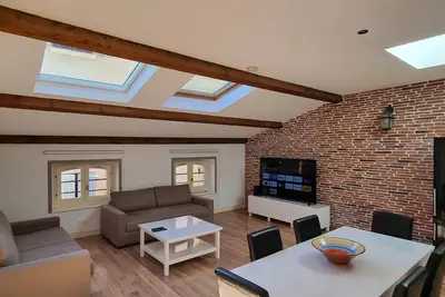 Image de Loft 80m2 en plein ❤️ de la vieille ville. 3 ⭐️⭐️⭐️