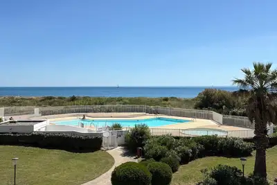 Image de St Cyprien rez de jardin avec Piscine en bord de plage