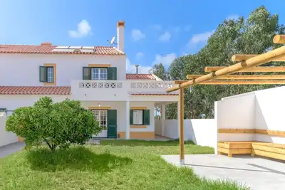 Image de Villa 'Nelson E Esperanca' avec terrasse privée, jardin privé et Wi-Fi