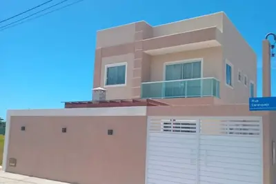 Image de Large house, inside a condominium with leisure infrastructure and close to the beach!