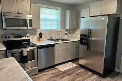 Image de Refreshed 4br | Near Atl Fun