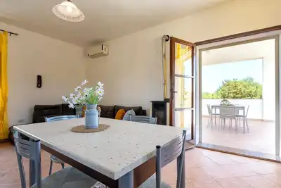 Image de Appartement 'In Villa Sul Mare 1' avec terrasse privée, Wi-Fi et climatisation