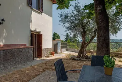 Image de Chambre 'Ulivo Con Giardino' avec vue sur la montagne, Wi-Fi et climatisation