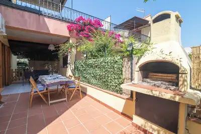 Image de Appartement 'Soffio Di Mare' avec terrasse privée, jardin privé et climatisation