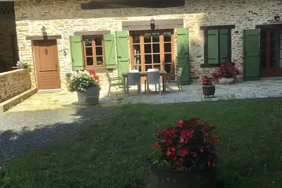 Image de Maison à la campagne avec jardin et terrasse. \nMaison de plain-pied.