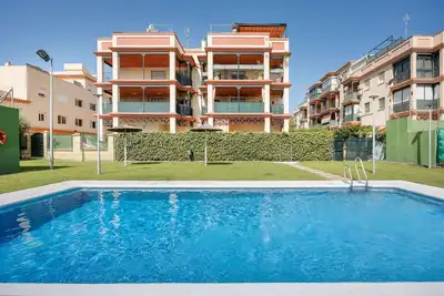 Image de Appartement 'Camaleón 7' avec piscine partagée, terrasse privée et climatisation