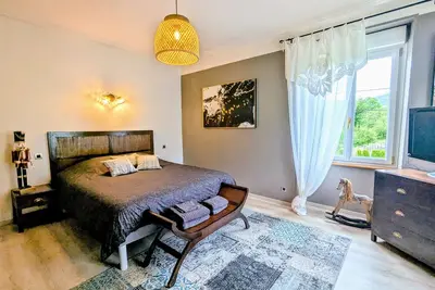 Image de Deux chambres avec entrée indépendante, accès à un jardin