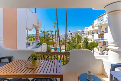 Image de Appartement de vacances 'Matchroom Golf' avec piscine commune et terrasse privée