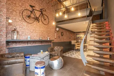 Image de Loft industriel unique en centre ville 130m2, 3 chambres, ideal en famille