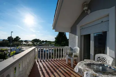 Image de Appartement de trois chambres avec la terrasse et la vue sur le mer Sukosan, Zadar (A-24601-a)