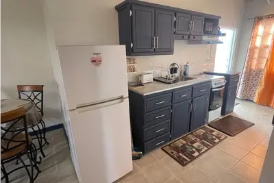2-bedroom upstairs Apt in brilliant Bridgetown with WiFi, Ac, full kitchen etc.
