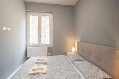 Image de Comfortable 40 sqm apartment, able to accommodate up to 4 people, located on the first floor of a building without a lift. The property is located a few minutes from the heart of Sanremo, in a quiet and well-served residential area. A short distance from
