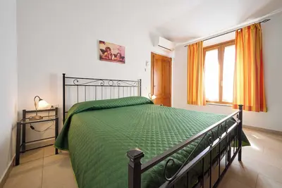 Image de Appartement 'Le Sugherine - Pala' avec piscine partagée, Wi-Fi et climatisation