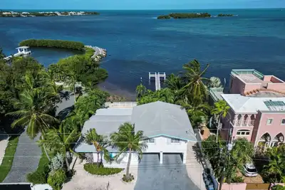 Sunset Key Escape Waterfront Pool Home with Dock and Sunset Views