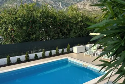 Image de Charming 1-bedroom apartment in Blagaj with pool and lush garden