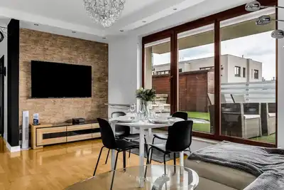 Image de Business Apartments - 49m2 Terrace, Parking, Metro by Rentujemy