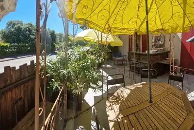 Image de Appartement 'De Charme' avec terrasse privée, jardin partagé et Wi-Fi