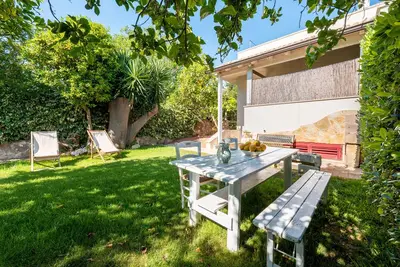 Image de Appartement 'Giardino Sul Mare' avec terrasse privée, Wi-Fi et climatisation