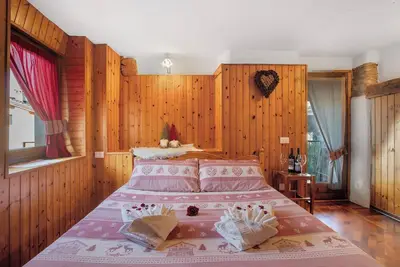 Image de Appartement 'La Petite Maisonnette' avec vue sur montagne et balcon