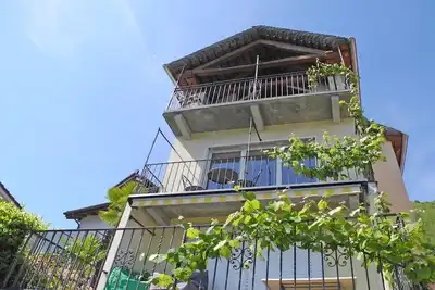 Image de Casa Santa Barbara: Stylish Swiss Holiday Home with Lake and Mountain Views