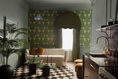 Image de A spacious two bedroom suite filled with bold wallpaper & sophisticated charm