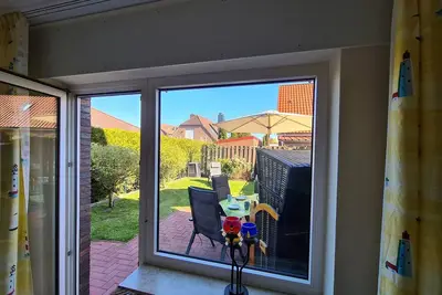 Image de Family vacation home directly at the spa gardens in Norddeich - fenced garden