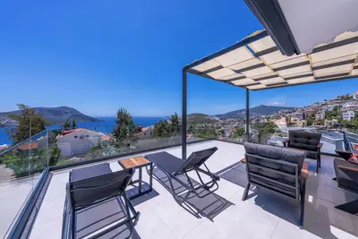 Image de Cozy 3-bedroom, 3-bathroom villa in Kalkan, close to the sea and amenities.