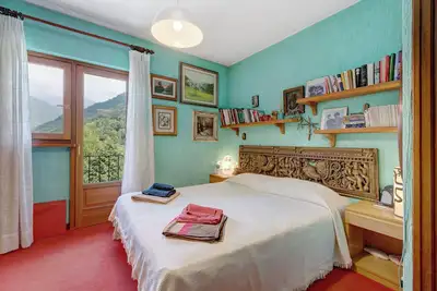 Image de Maison de vacances 'Nature, Montagnes et Lacs' avec vue sur les montagnes, terrasse privée et Wi-Fi