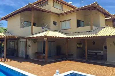 Image de Beach House in Guarajuba 5 Suites Cond. Genipabu Summer Place Background with Lagoon