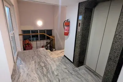 Image de The Madurai lounge-over looking Meenakshi temple. top floor of hotel Padmam