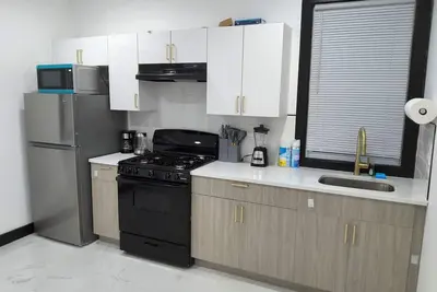 Image de Spacious 4-bedroom, 4 beds 2 bath each, in lovely Newark with Ac, WiFi.