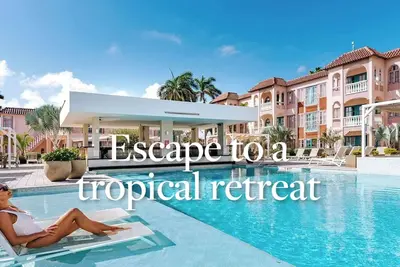 Image de Charming 2Br, 2 bath Resort Condo, Ac, pools, hot tubs, 1m to main strip/beach, Aruba