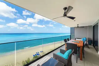 Image de Stunning Beachfront Penthouse with Ocean Views where modern design meets coastal tranquility