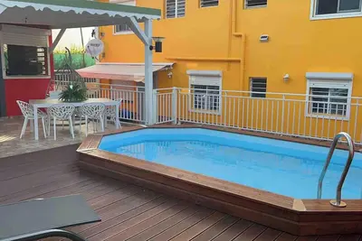 Image de Homerez - Appt Les Abymes, piscine privée.