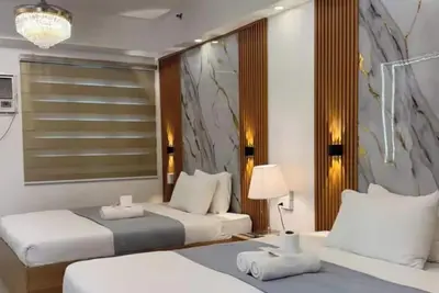 Image de Détendez-vous dans le secret le mieux gardé de Pasay City un condo spacieux