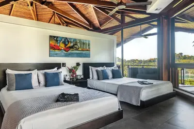 Image de Villa Monkitail in Tulemar, a luxurious suite in the rainforest with ocean views and 3 resort pools