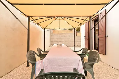 Image de Maison de vacances 'Ogliastra' avec vue montagne, jardin privé et climatisation