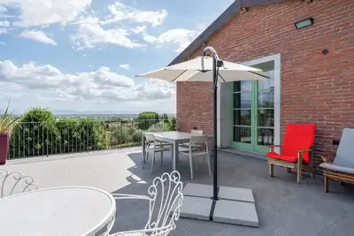 Image de Maison de vacances 'Dulù - Luminoso Spazio' avec jardin partagé, balcon et Wi-Fi