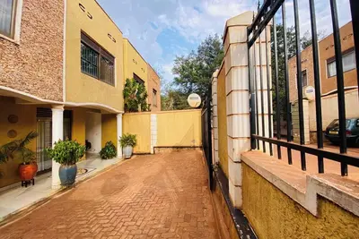 4-bedroom estate in welcoming Kigali-Rwanda with WiFi in a family-friendly area.