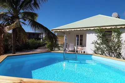 Image de Homerez - Maison chaleureuse à Le Moule avec piscine partagée
